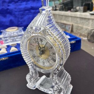 This is a Shannon Crystal Legends mantel clock by Godinger.